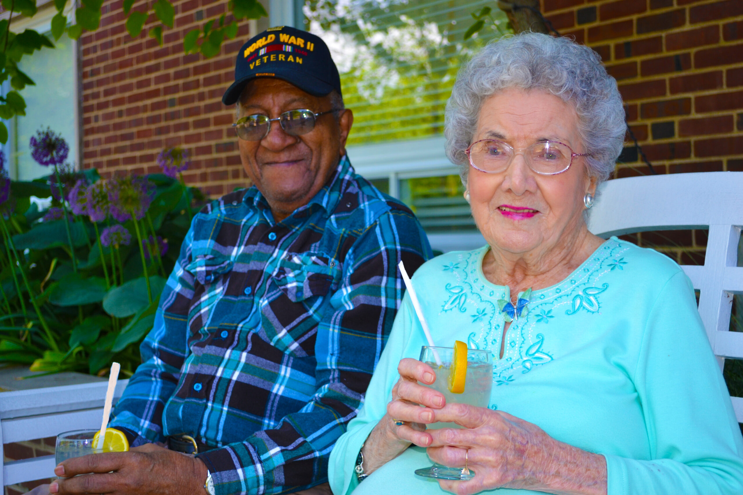 Elder Man and Woman Drinking Lemonade